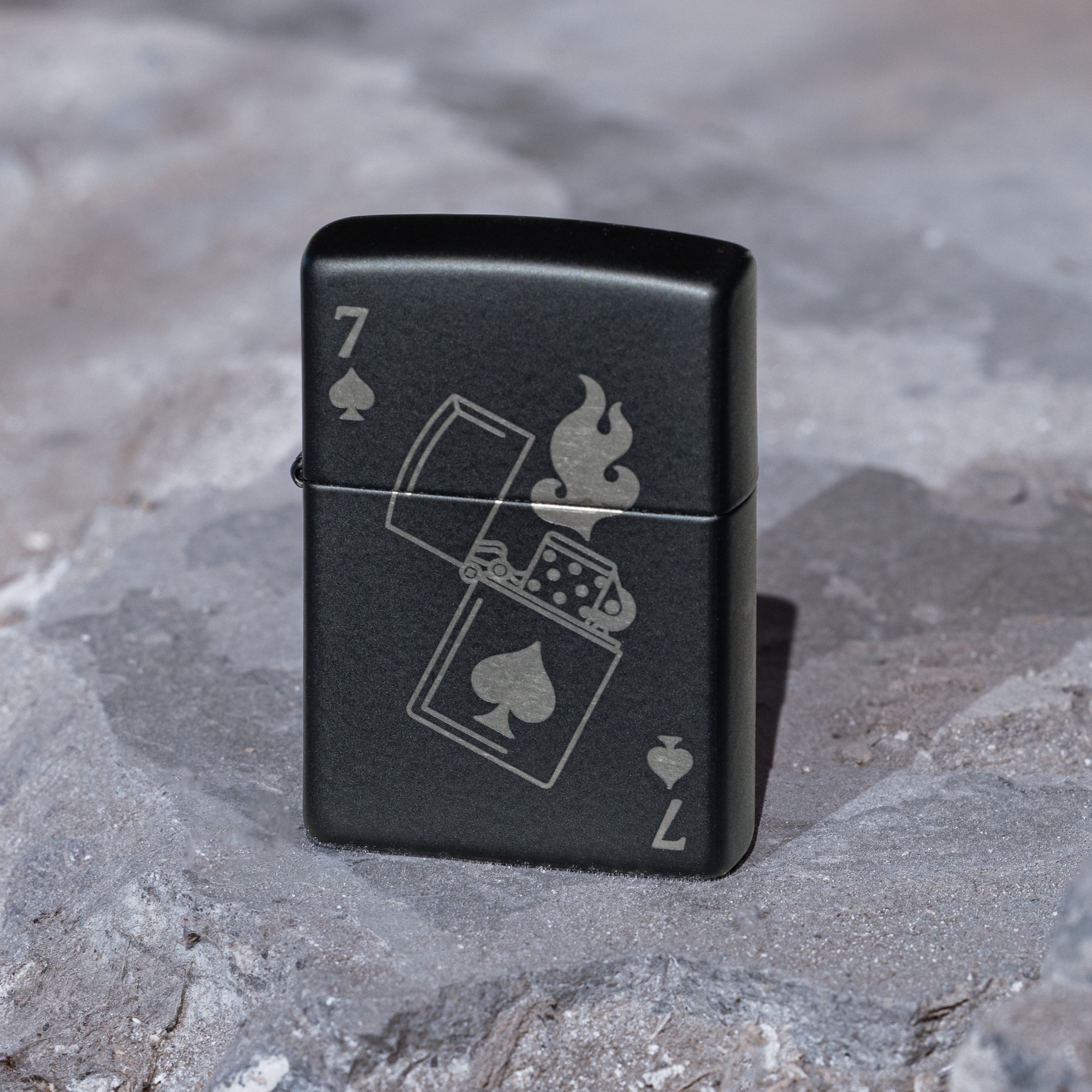 Front shot of Zippo Bejeweled Beetle Design High Polish Brass Windproof Lighter standing at a 3/4 angle.