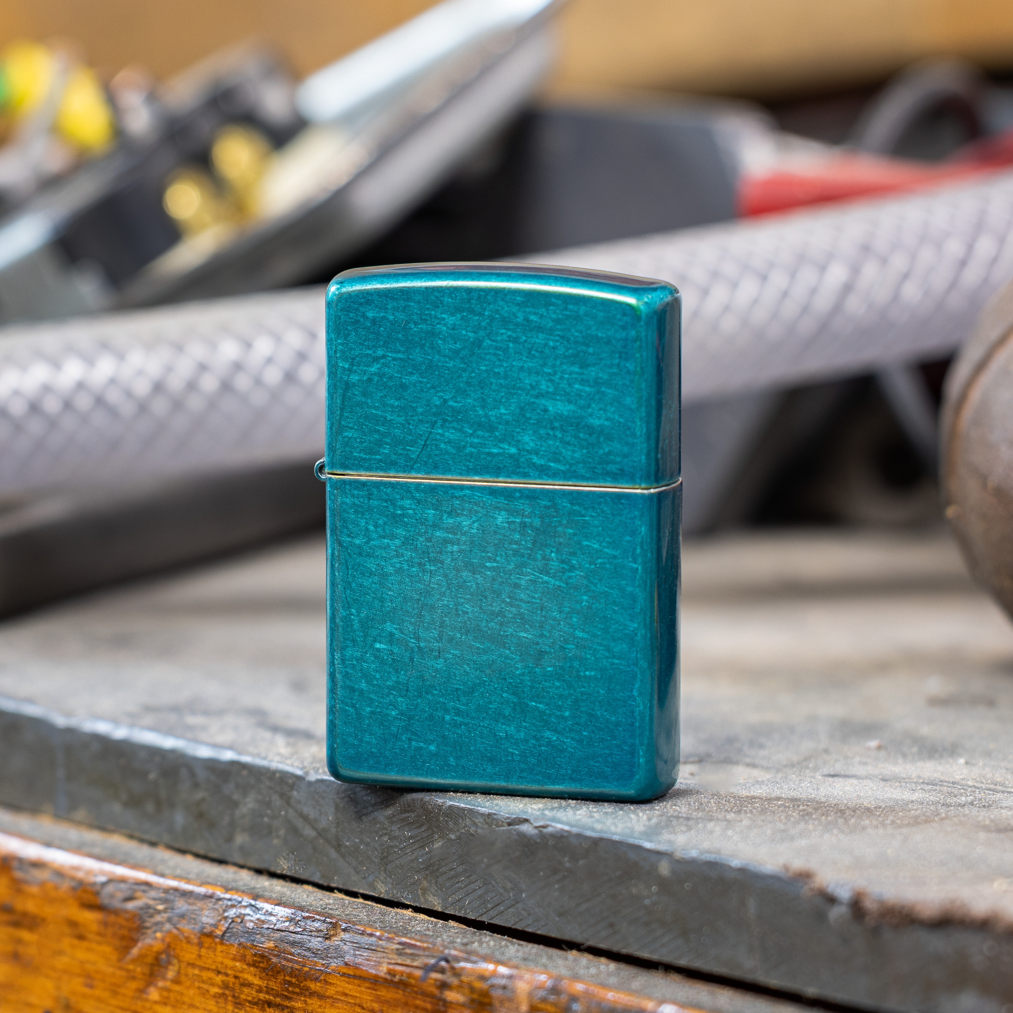 Front shot of Zippo Bejeweled Beetle Design High Polish Brass Windproof Lighter standing at a 3/4 angle.