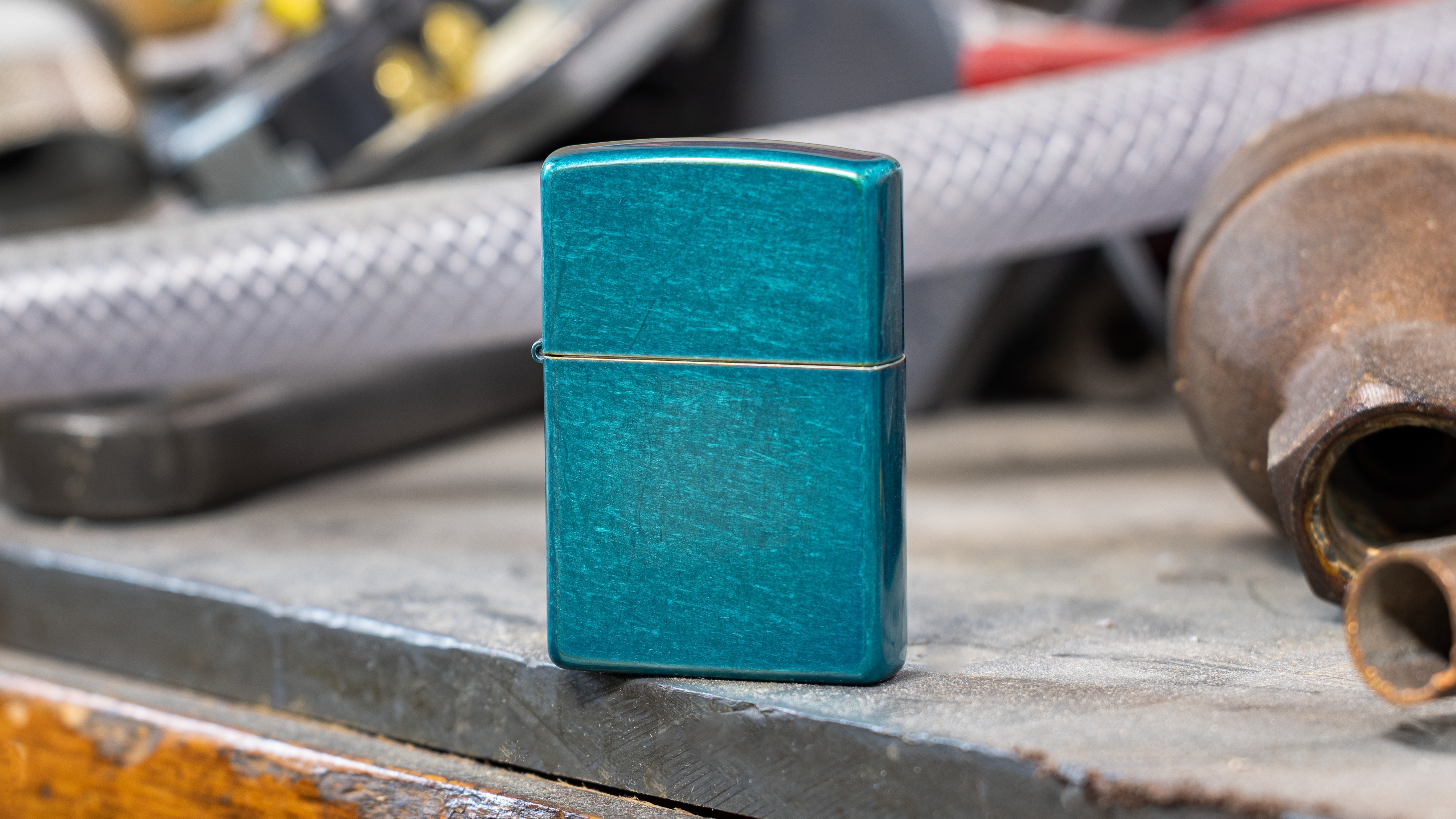 Front shot of Zippo Bejeweled Beetle Design High Polish Brass Windproof Lighter standing at a 3/4 angle.