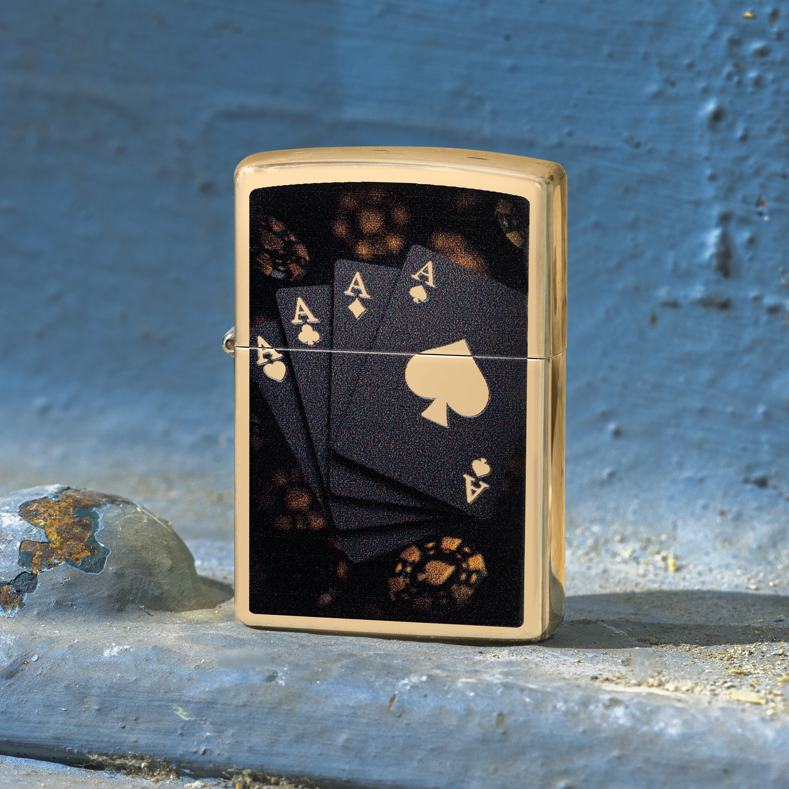 Front shot of Zippo Bejeweled Beetle Design High Polish Brass Windproof Lighter standing at a 3/4 angle.