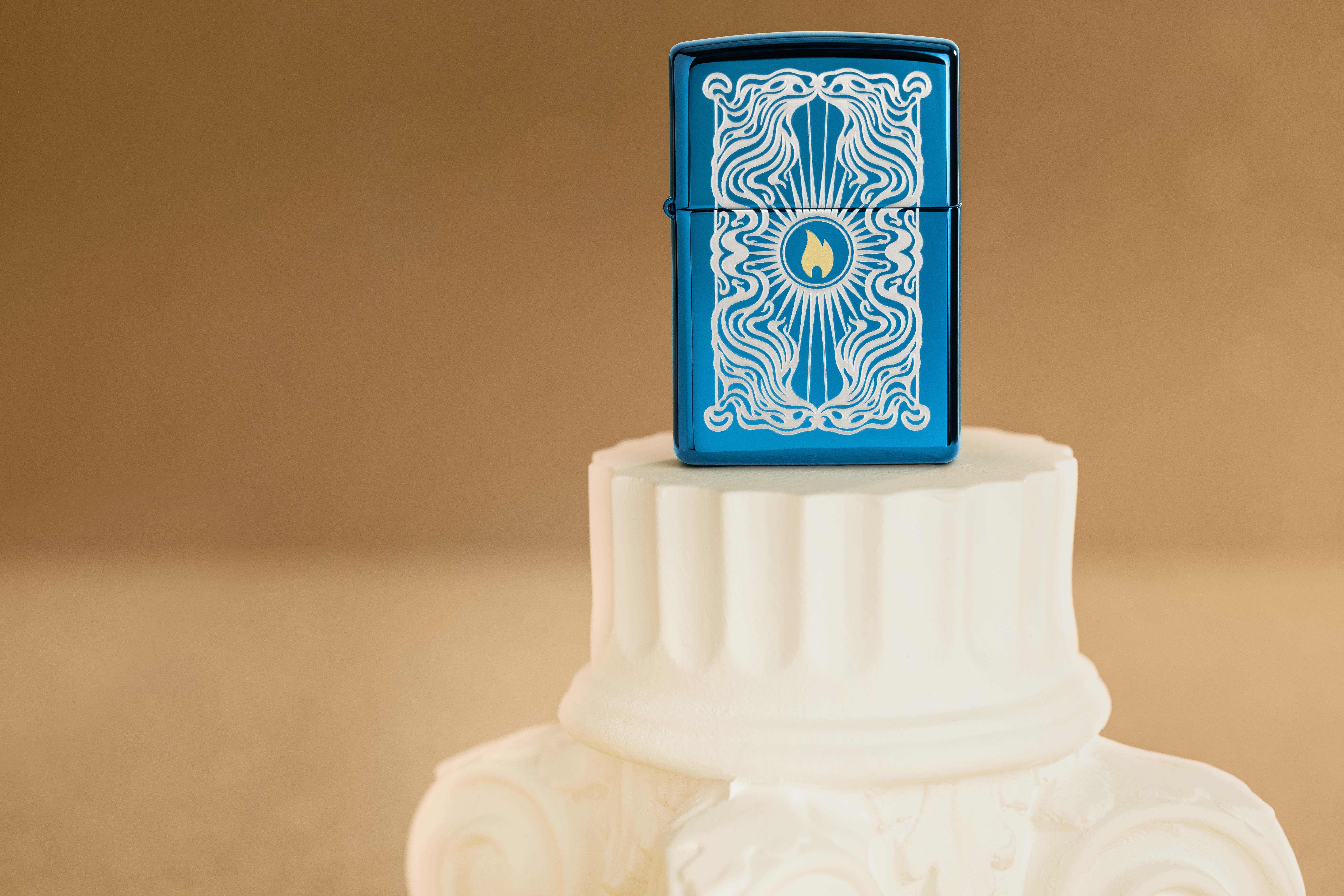 Front shot of Zippo Bejeweled Beetle Design High Polish Brass Windproof Lighter standing at a 3/4 angle.