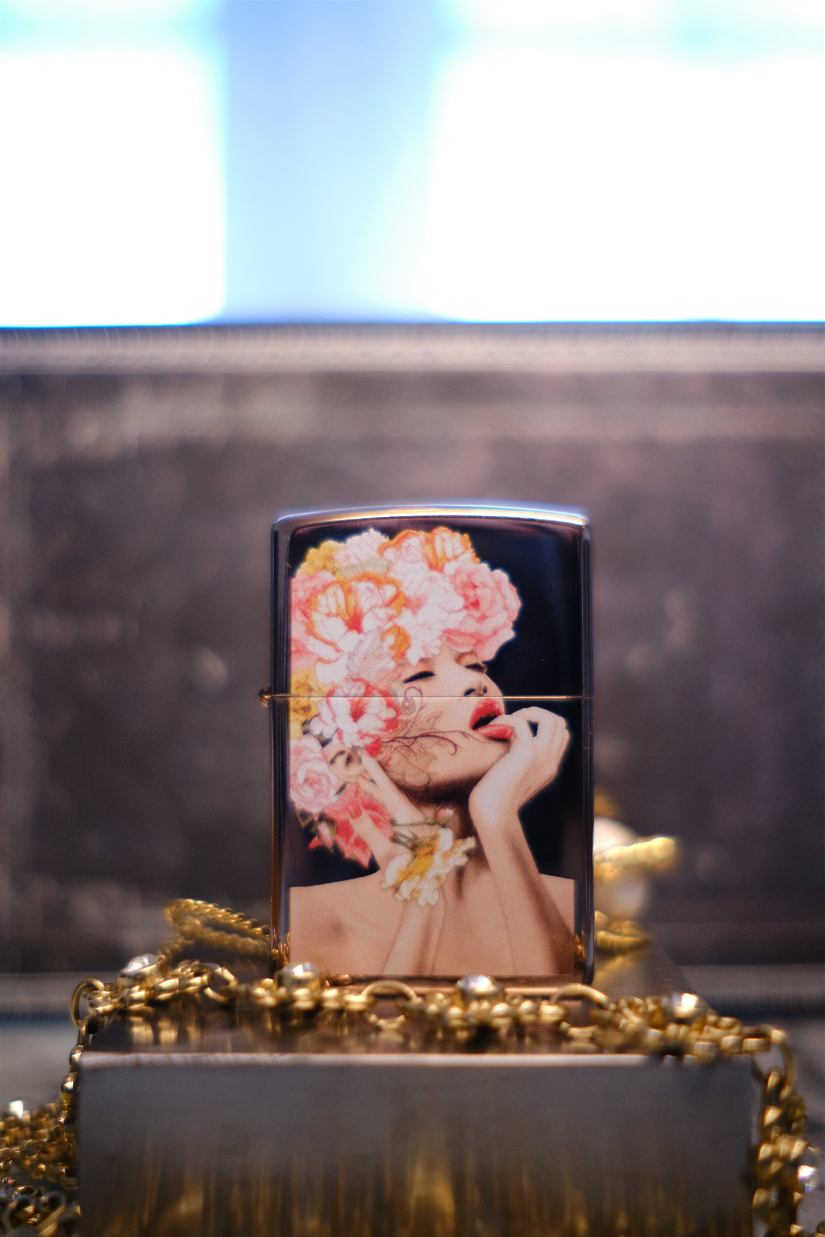 Front shot of Zippo Bejeweled Beetle Design High Polish Brass Windproof Lighter standing at a 3/4 angle.