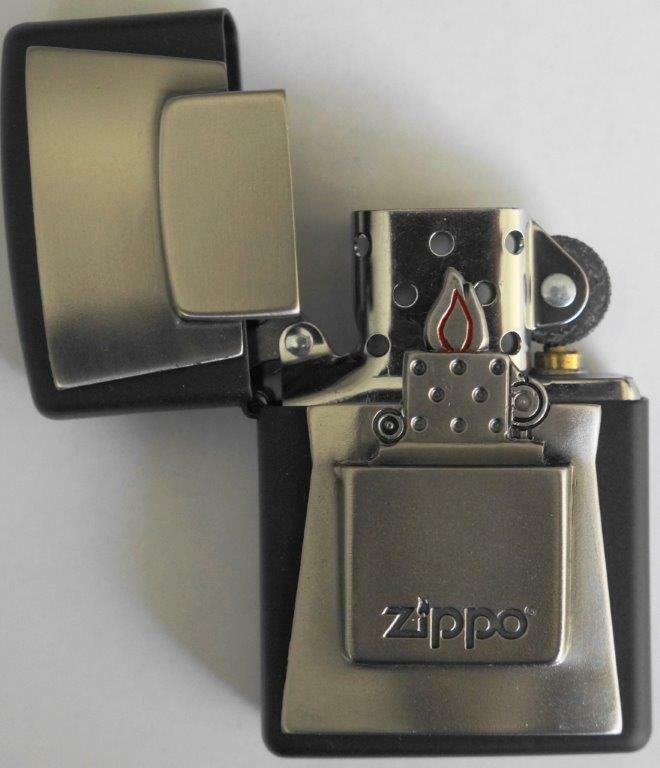 Front shot of Zippo Bejeweled Beetle Design High Polish Brass Windproof Lighter standing at a 3/4 angle.