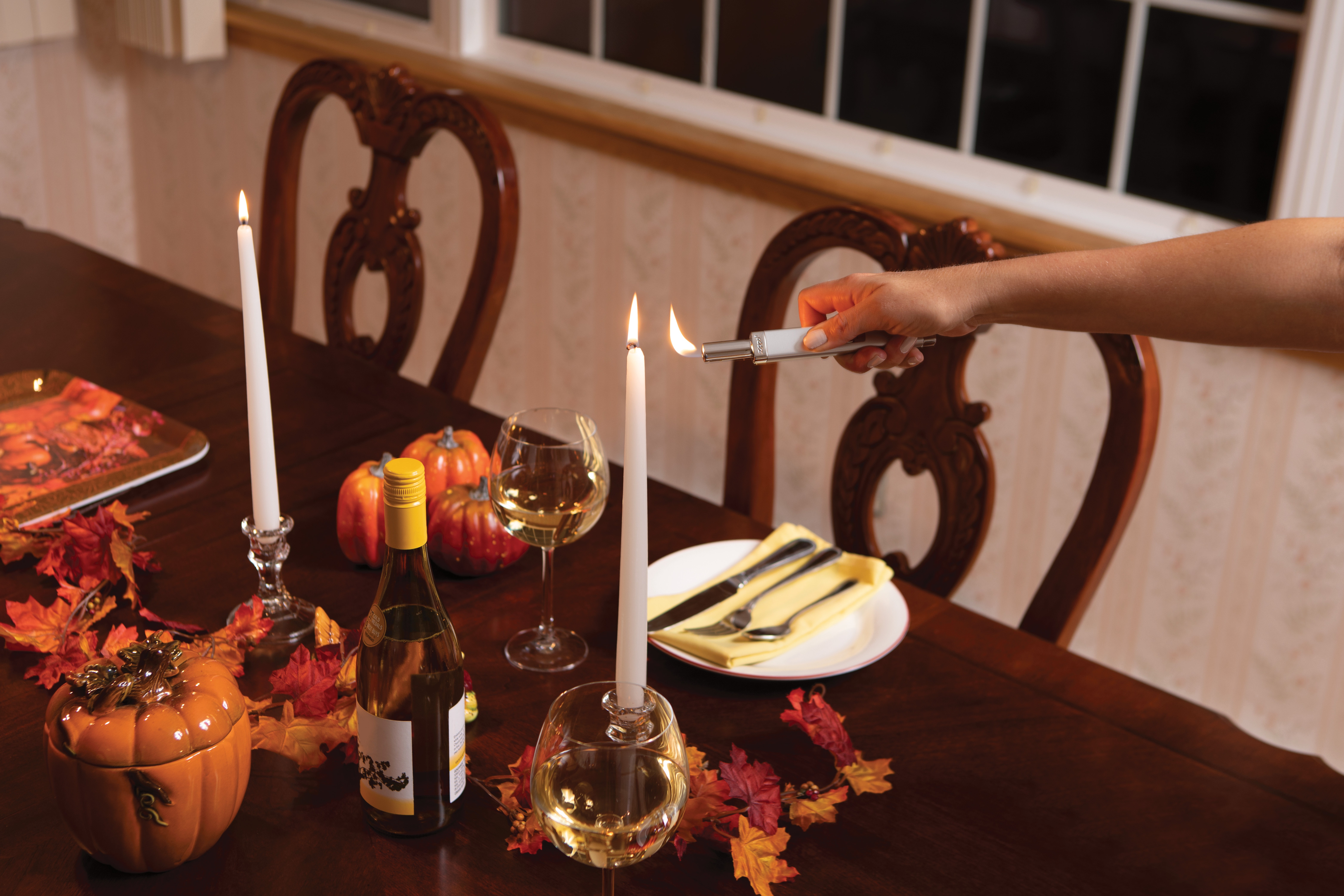 Front shot of Zippo Bejeweled Beetle Design High Polish Brass Windproof Lighter standing at a 3/4 angle.